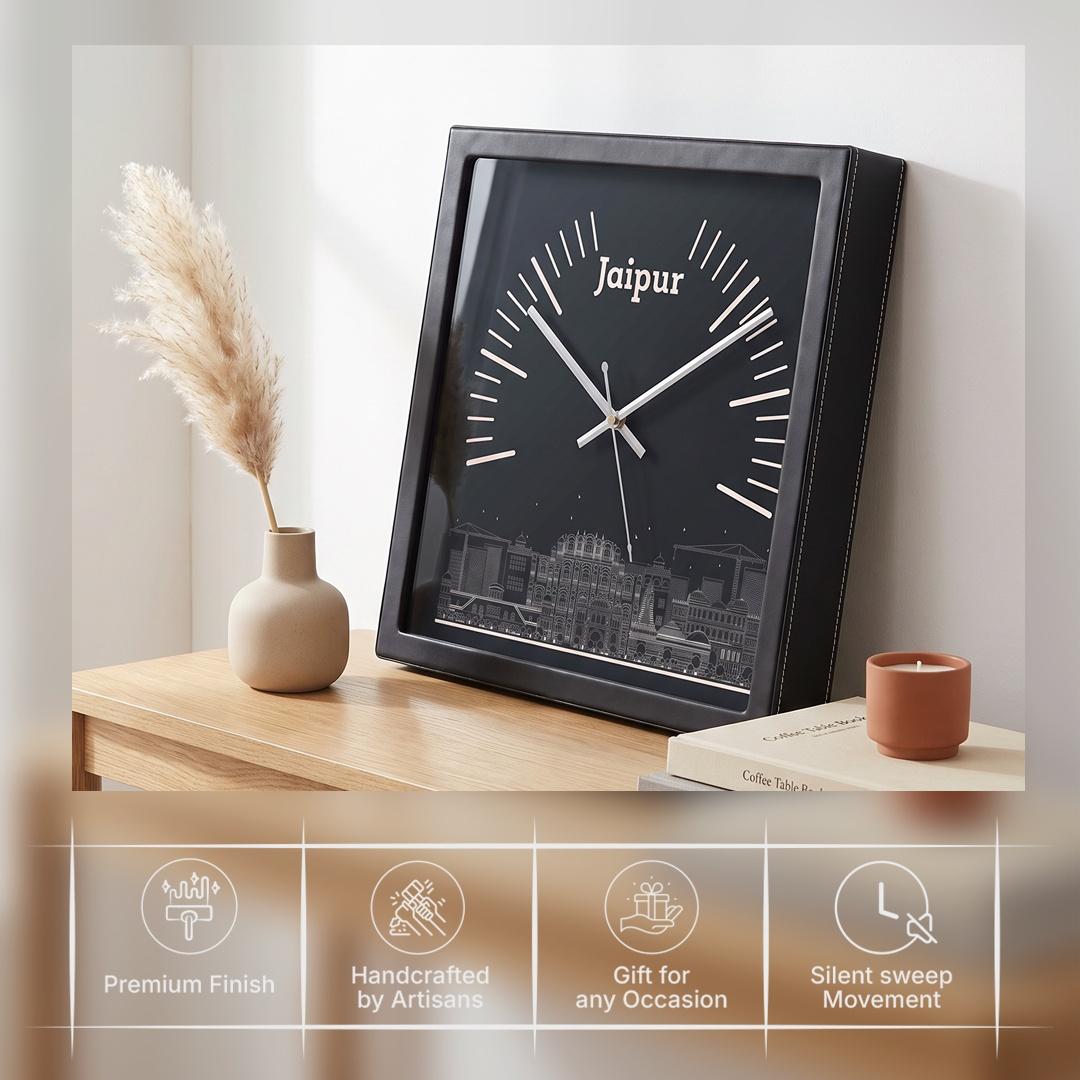 Silver hands over white radial markers on a deep green clock dial