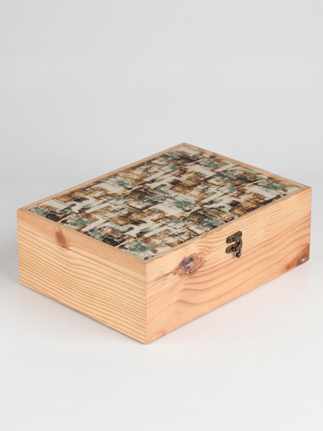 Wooden box with a patterned lid