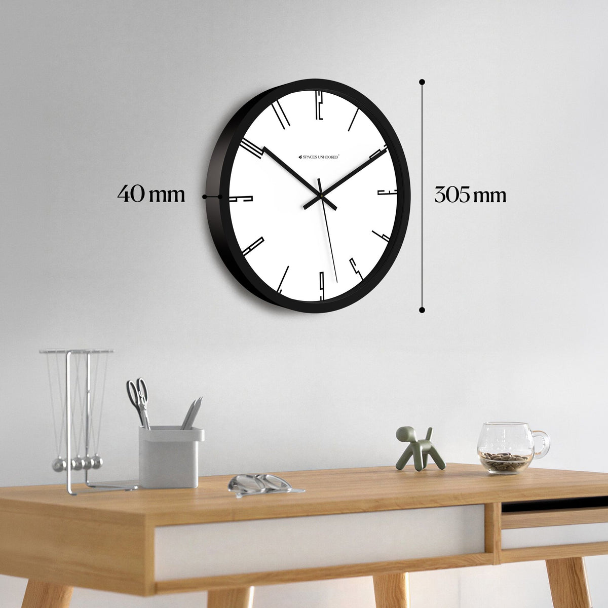 Right side view round black wall clock slim depth – Spaces Unhooked modern decorative wall clock