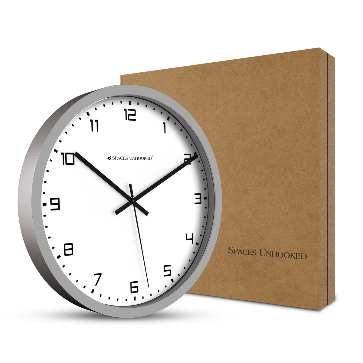 
Spaces Unhooked silver wall clock hanging on wall modern interior – bold numeral silent clock home decor India