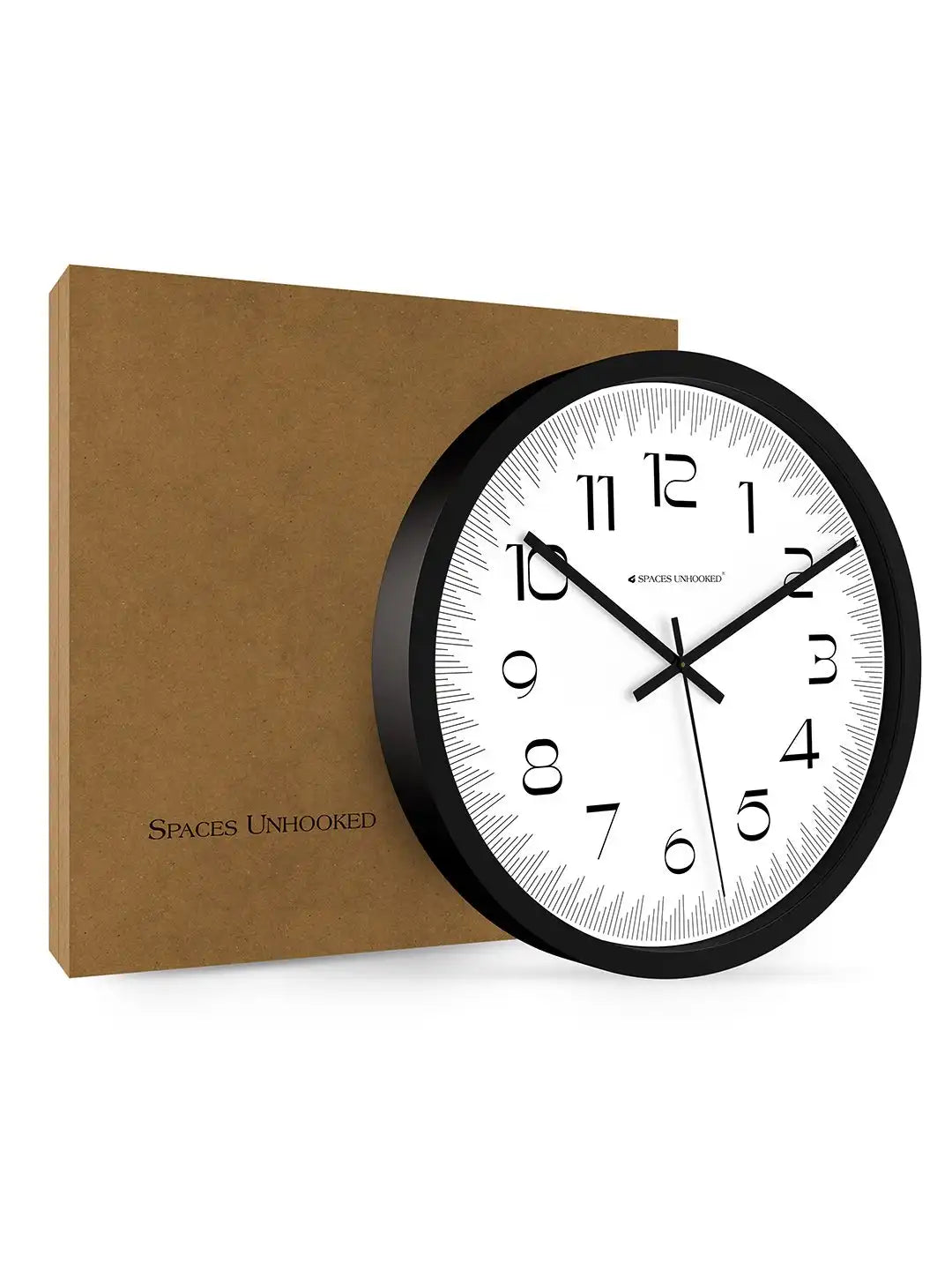 Spaces Unhooked black wall clock with premium branded packaging box for secure delivery