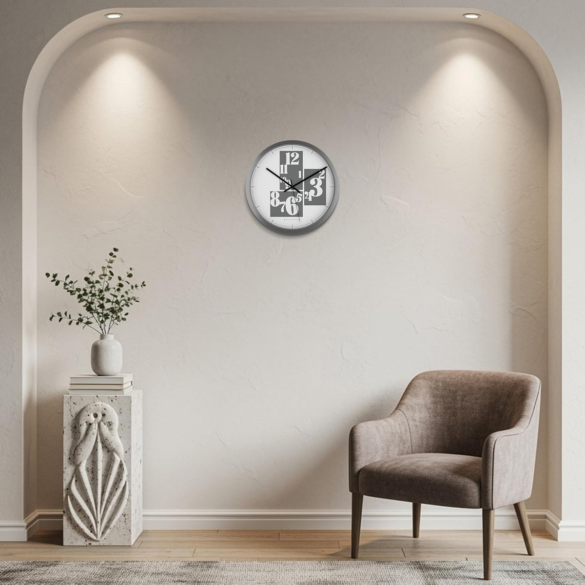 Wall clock on a wall with a chair and decorative elements in a room.
