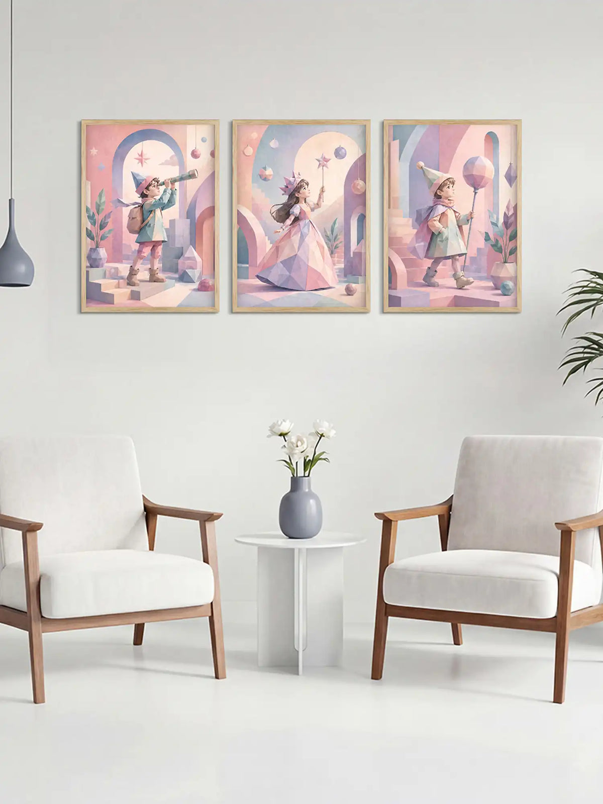 Three colorful wall art prints above a white table with a vase and flowers, in a room with two chairs.