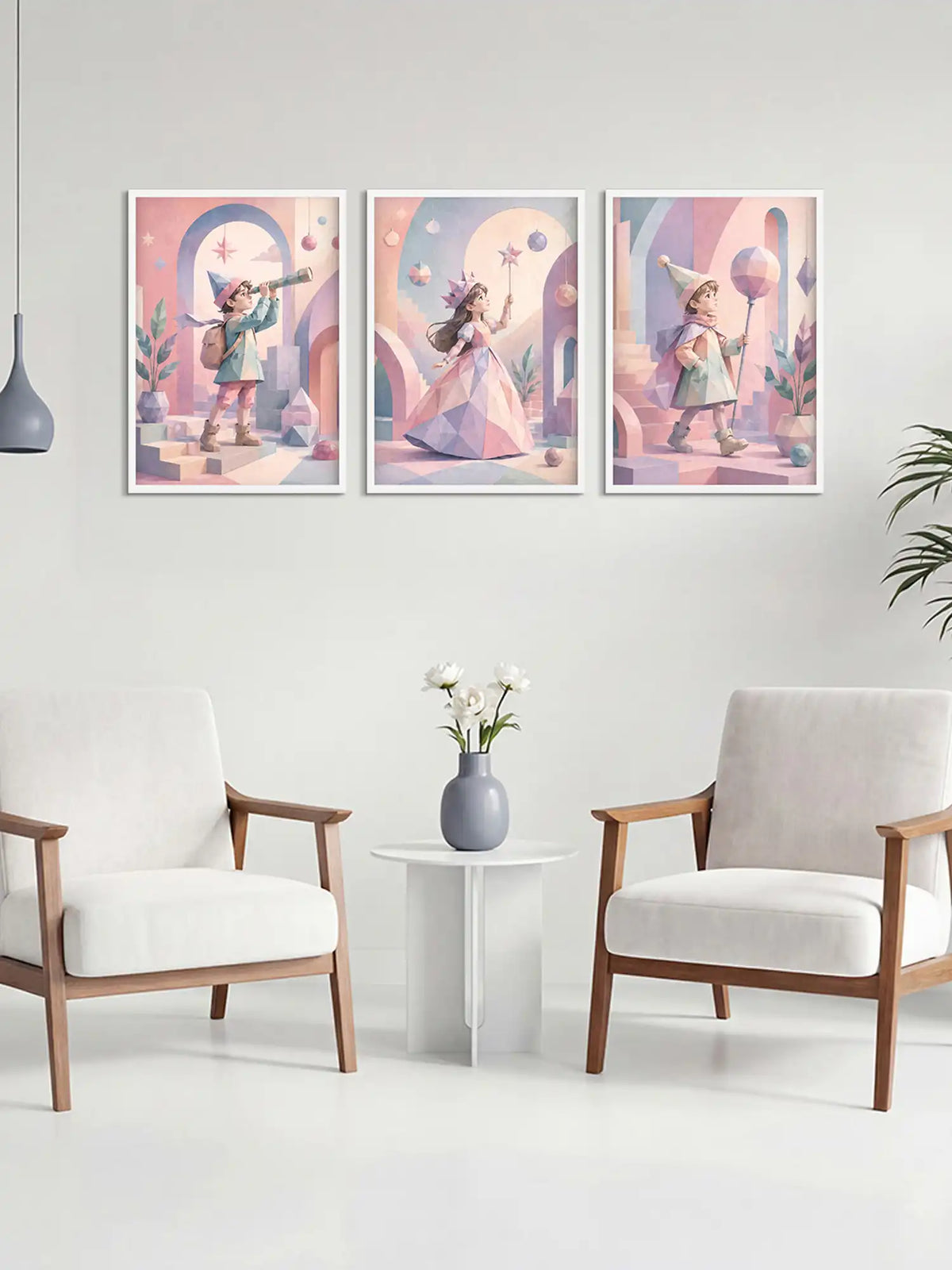 Three colorful wall art prints above a white table with a vase and flowers, in a room with two chairs.
