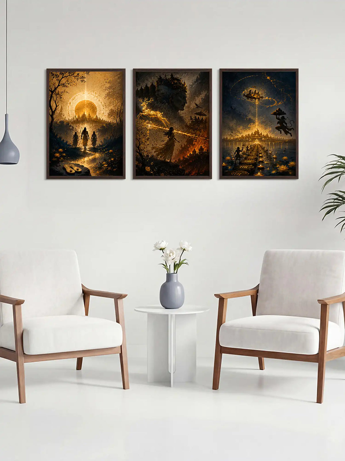 Three dark fantasy-themed paintings on a wall above a white table with a vase and flowers, flanked by two white chairs.