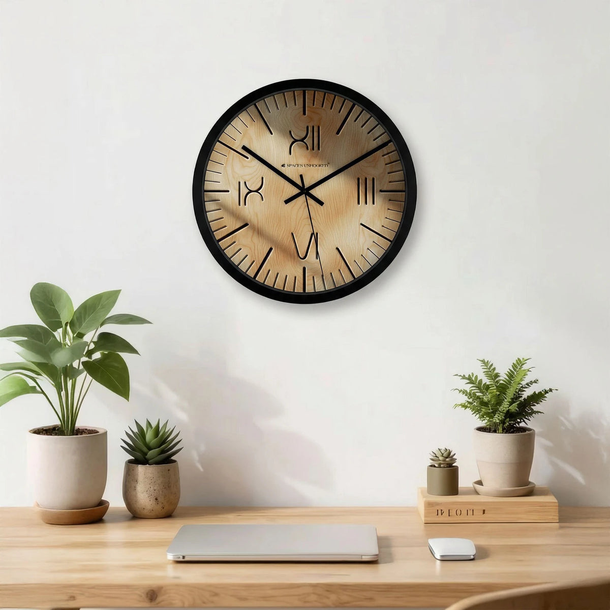 Rustic wooden wall clock with engraved numerals in a minimalist home setting